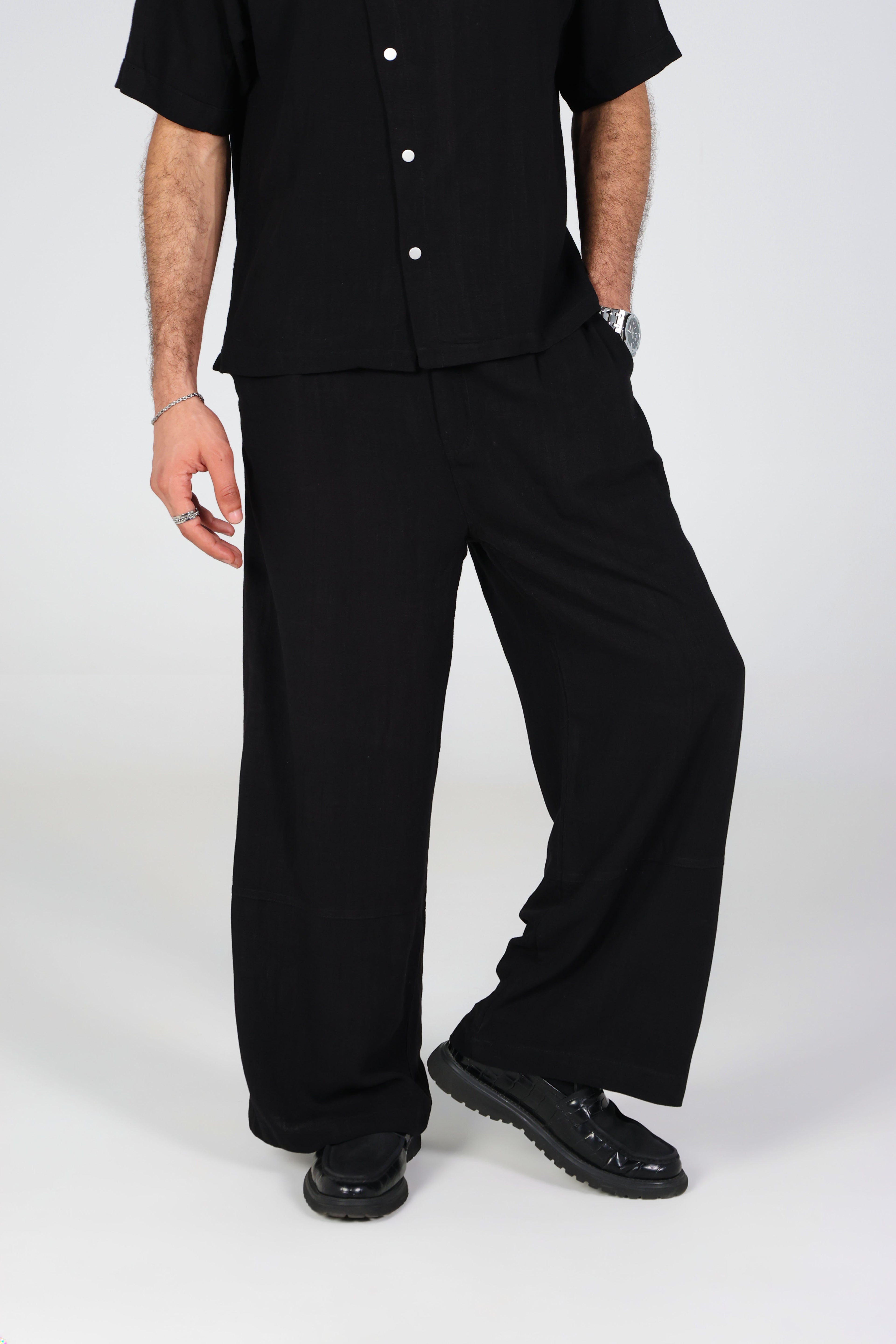 Black wide-leg linen trousers