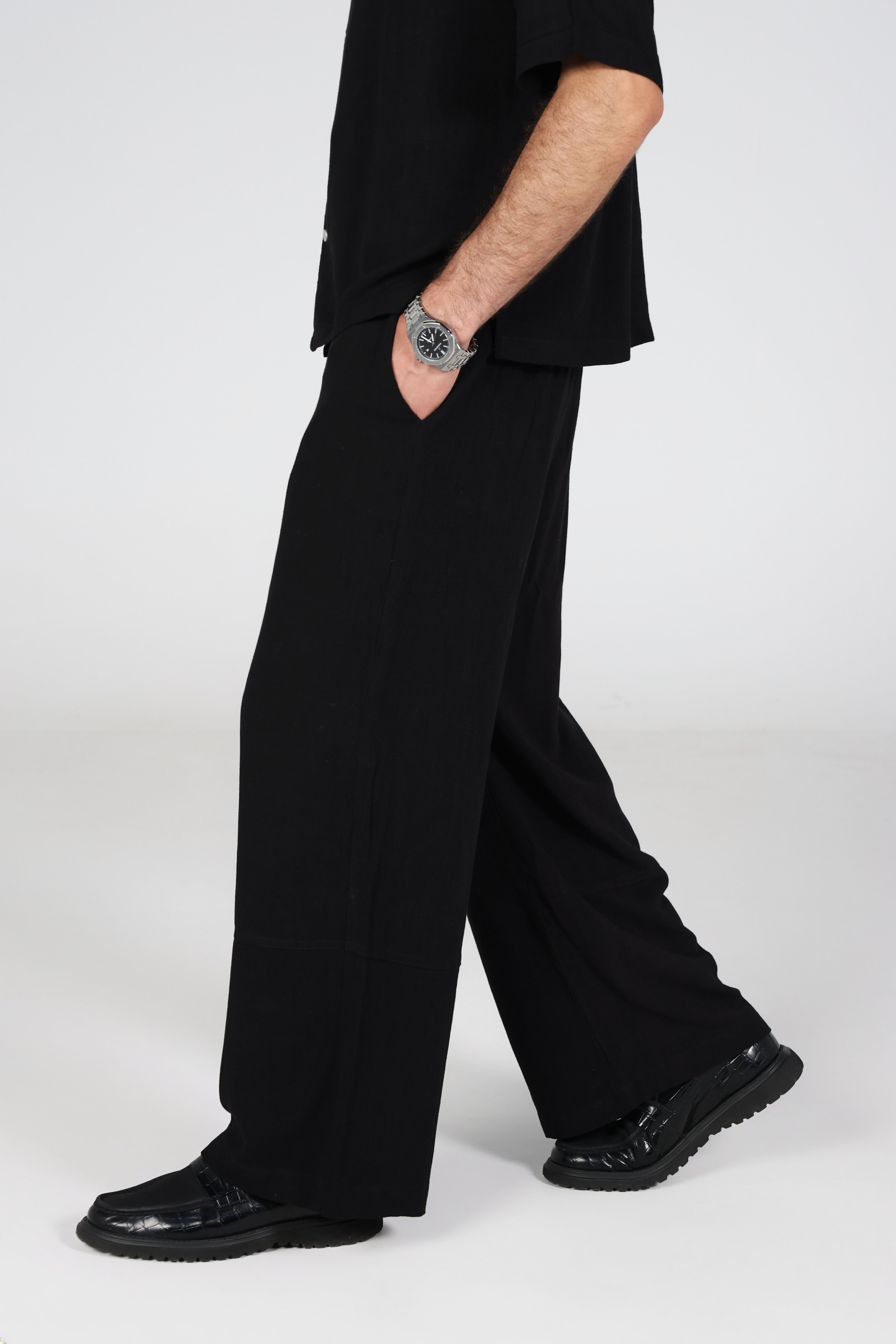 Black wide-leg linen trousers