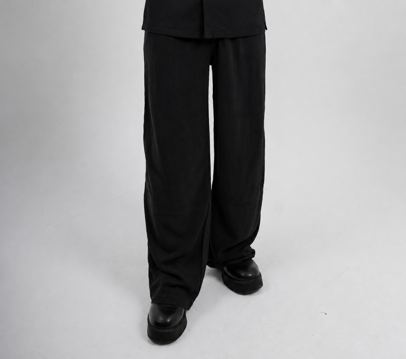 Black wide-leg linen trousers