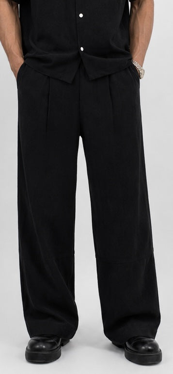Black wide-leg linen trousers