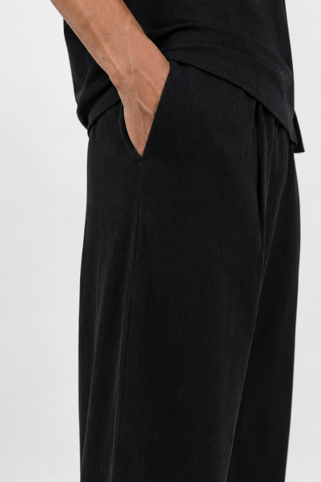 Black wide-leg linen trousers